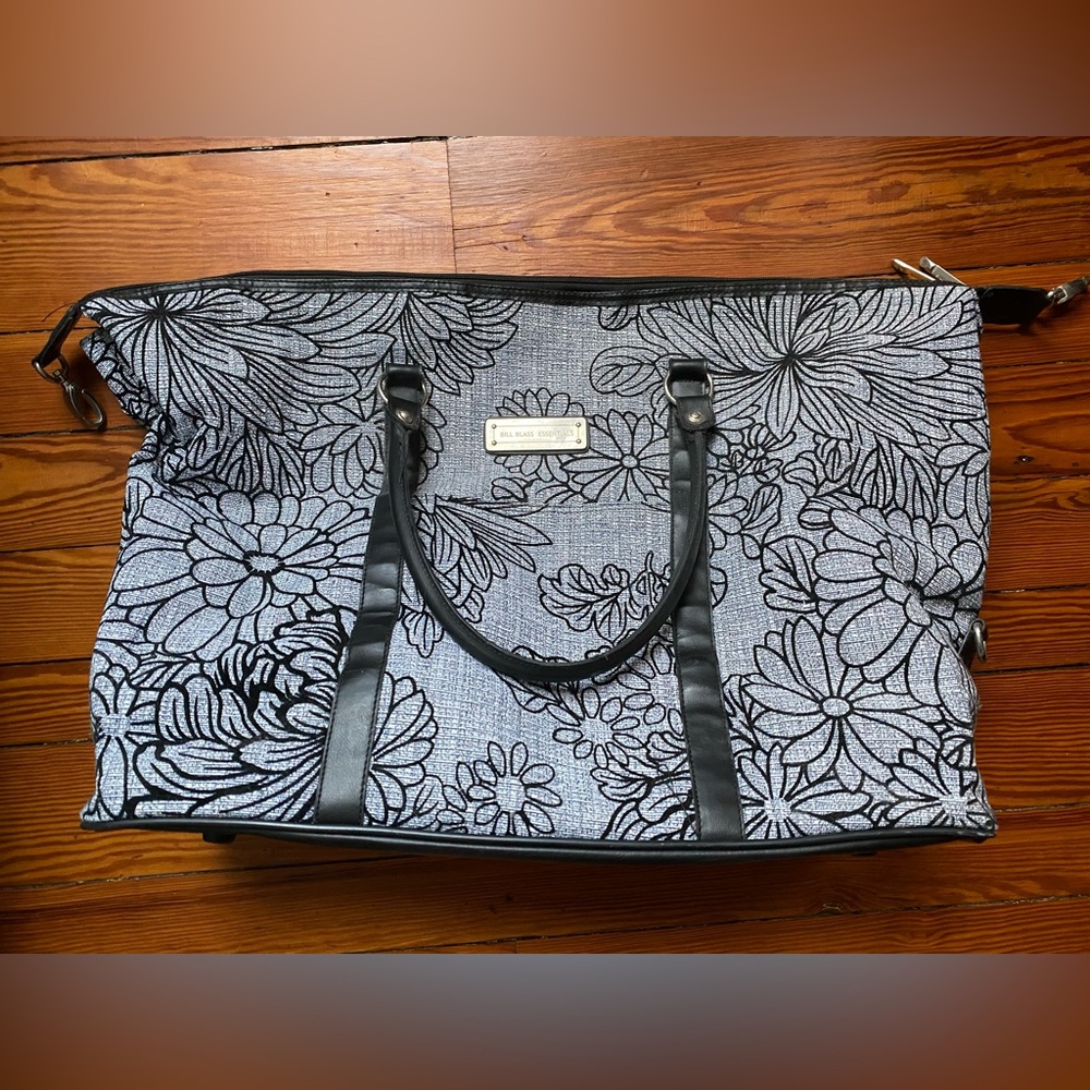Large Bill Blass Essentials floral blue duffle bag / travel satchel with feet